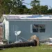 severely damaged houses after hurricane in florida