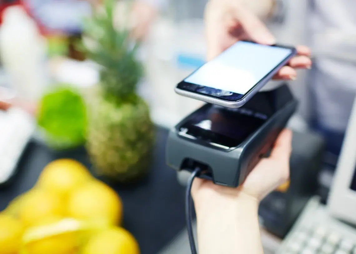 contactless payment with smart phone at checkout