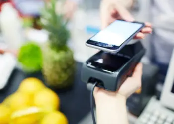 contactless payment with smart phone at checkout