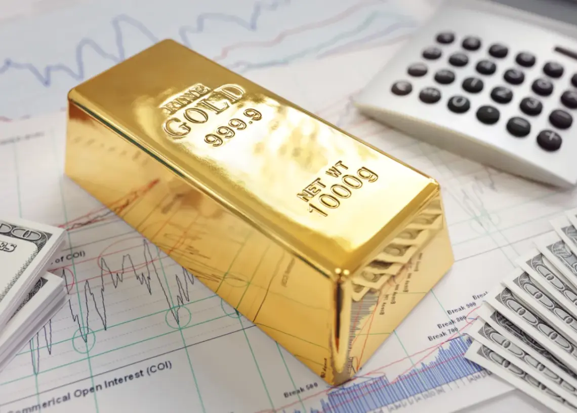 gold bullion bar on a stocks and shares chart