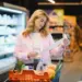 woman checking grocery receipt for budgeting