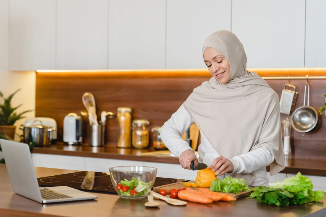 woman in hijab preparing healthy meal