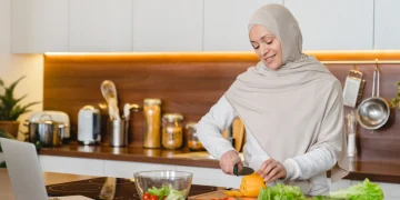 woman in hijab preparing healthy meal