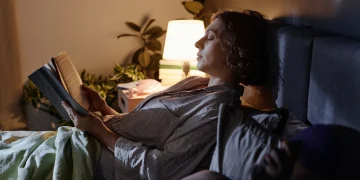 woman reading in bed