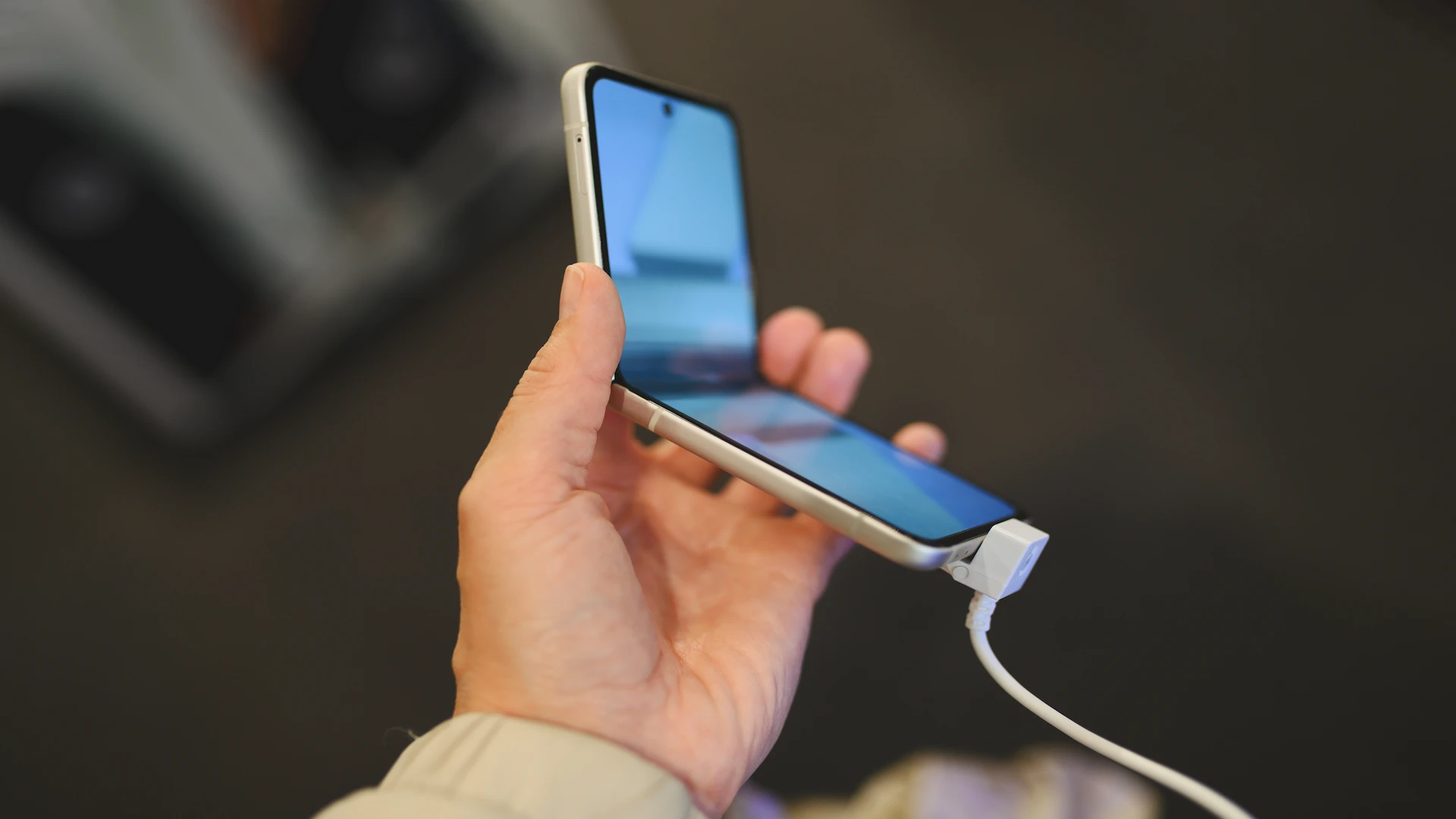 close up of woman holding mobile phone in hands