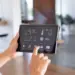 smart home control on tablet in modern interior