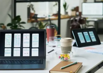 modern office workspace featuring laptops display