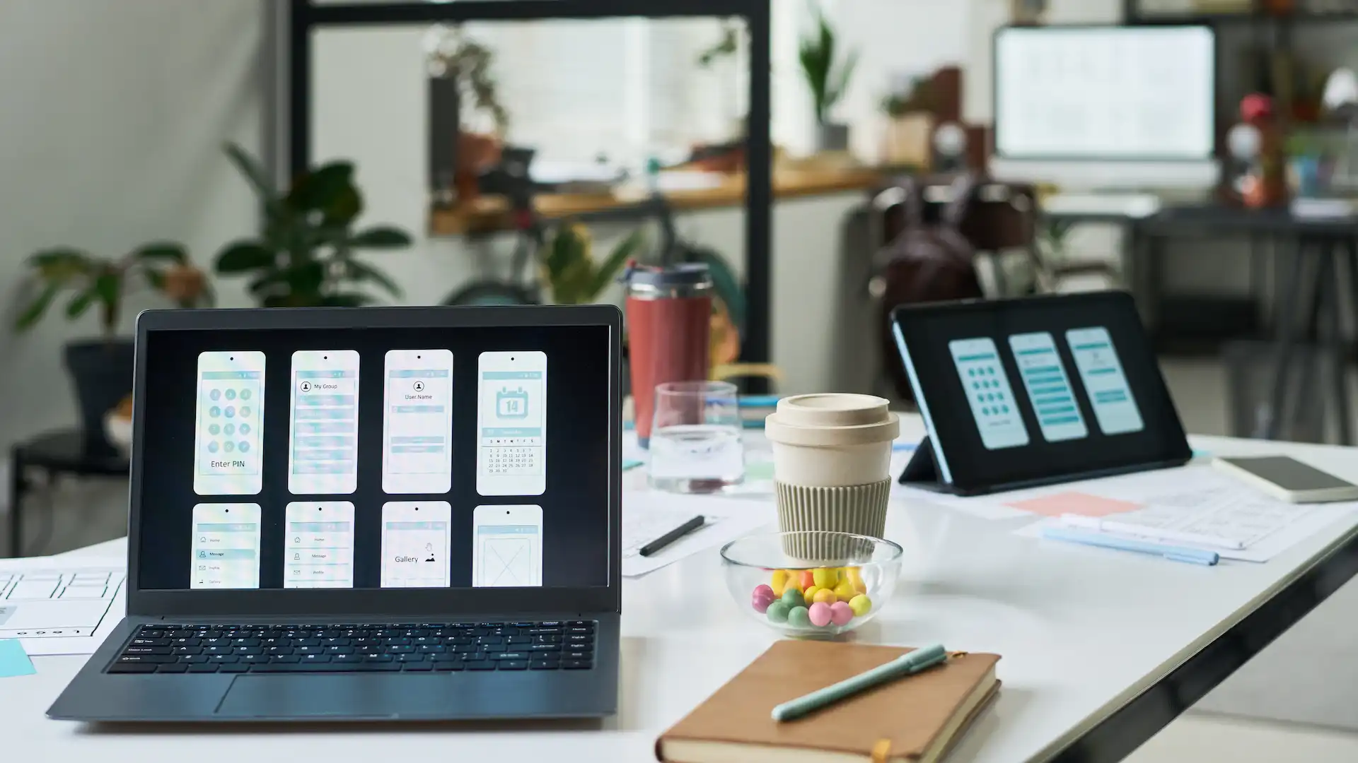 modern office workspace featuring laptops display