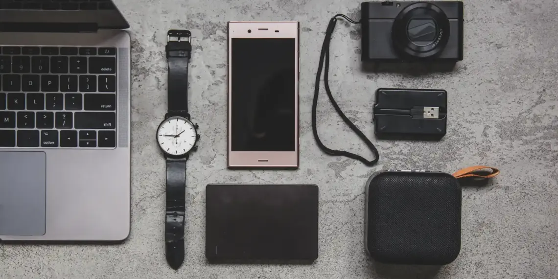 top view of laptop and mobile accessories
