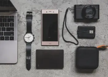 top view of laptop and mobile accessories
